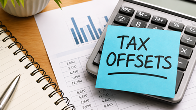 Calculator-and-financial-documents-representing-Australian-tax-offsets.png